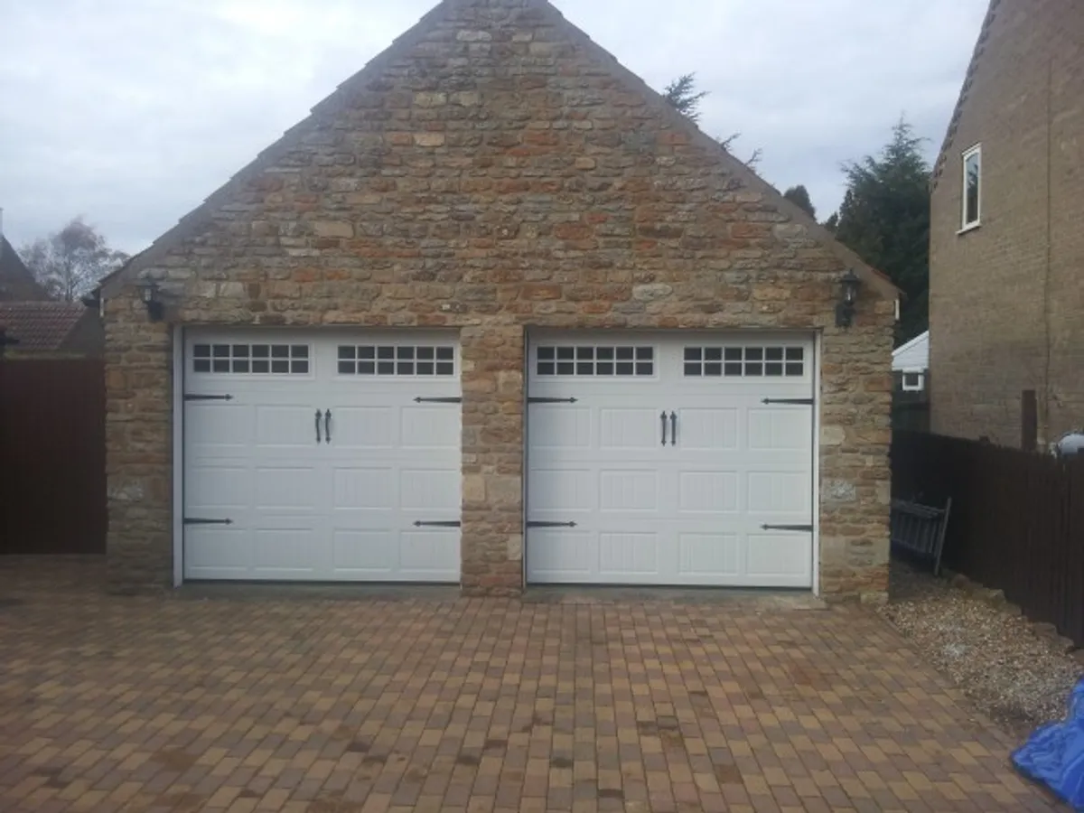 Cover for Beautiful Coach House Sectional Garage Doors in Sleaford - Premium Installation Services
