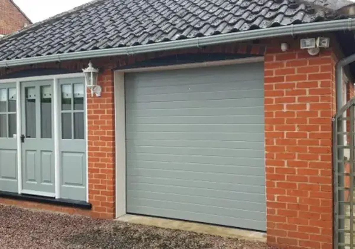 Cover for Insulated Sectional Garage Door Installation in Grantham - Custom Garage Doors