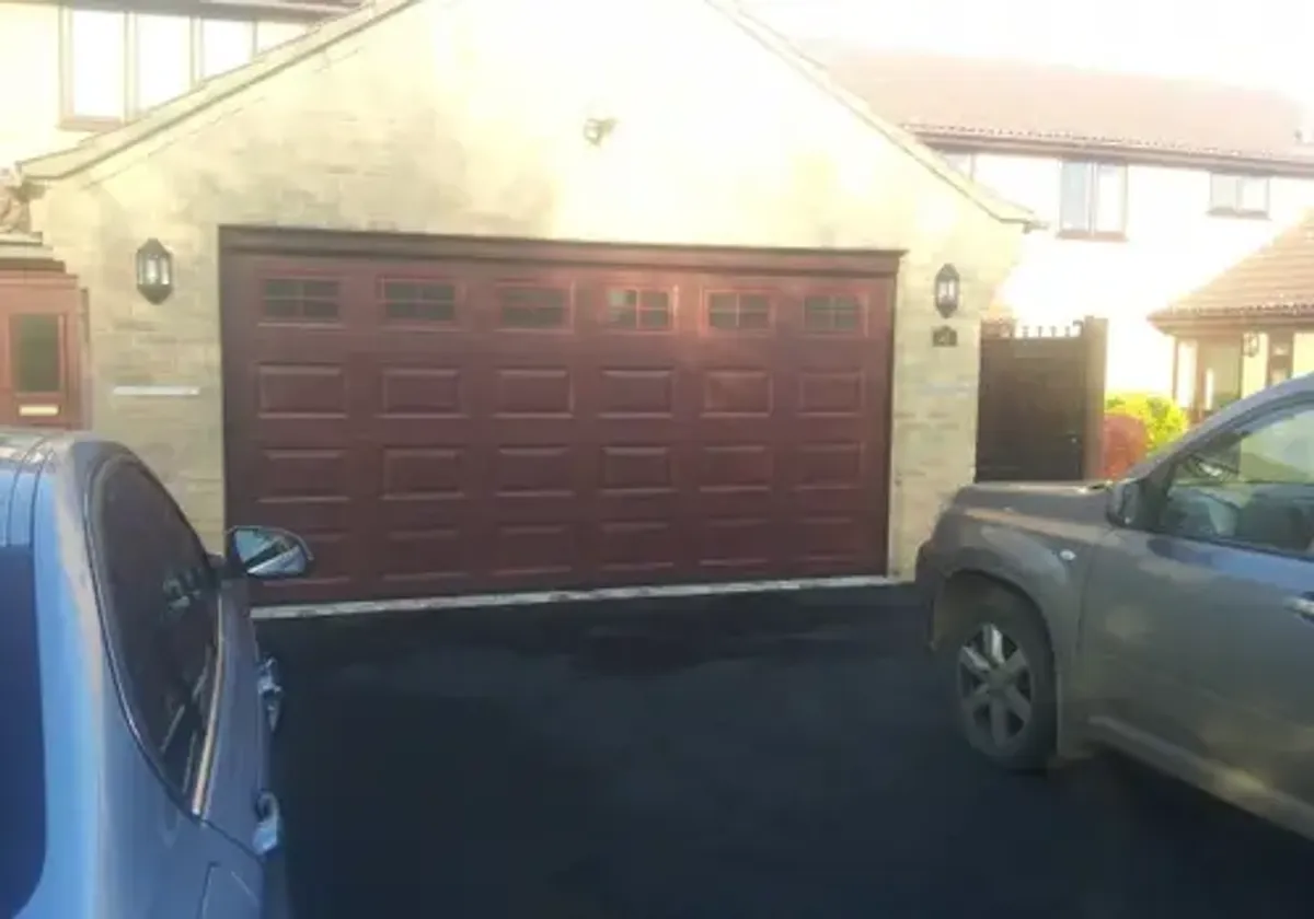 Cover for Enhance Your Home with an Automatic Double Sectional Garage Door