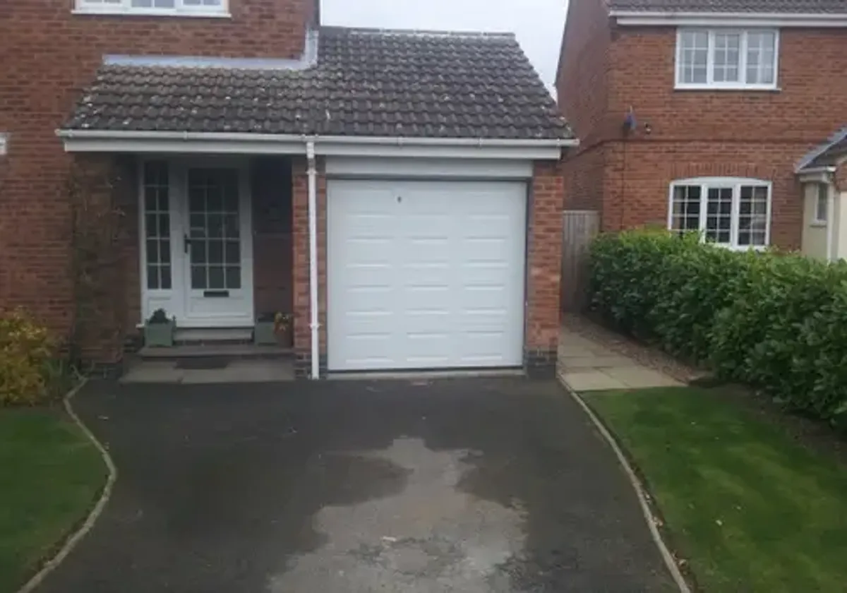 Cover for Enhance Your Home with an Automatic Georgian Sectional Garage Door