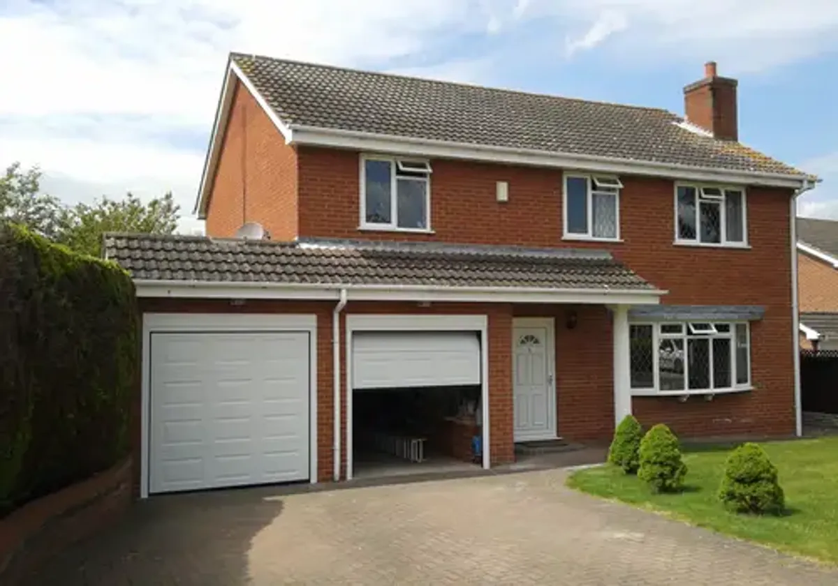 Cover for The Perfect Fit - Twin Sectional Garage Doors in Southwell
