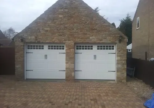 Cover for Beautiful Coach House Sectional Garage Doors in Sleaford - Premium Installation Services