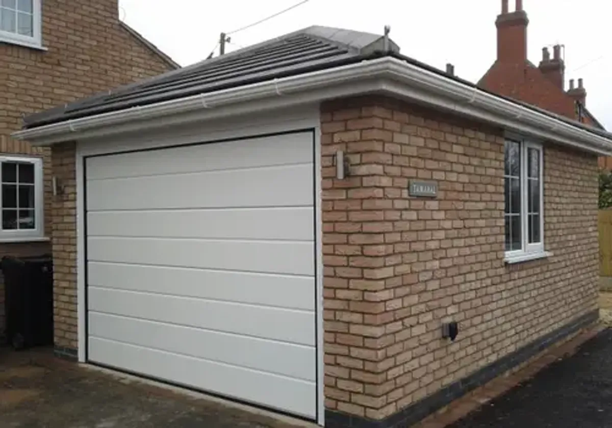Cover for New Automatic Sectional Garage Door (M-Rib) Installation in Grantham