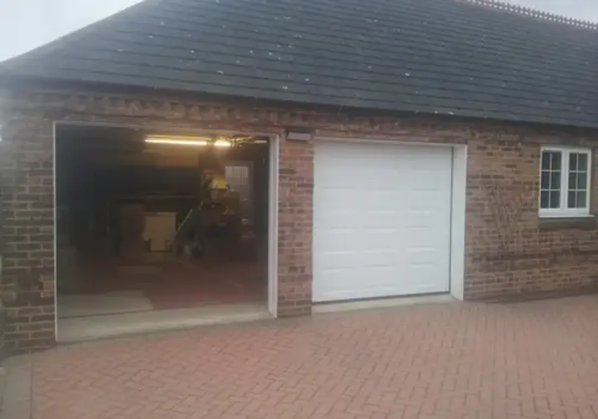 Cover for Beautiful GDS Insulated Sectional Garage Doors in a Georgian Style in Newark