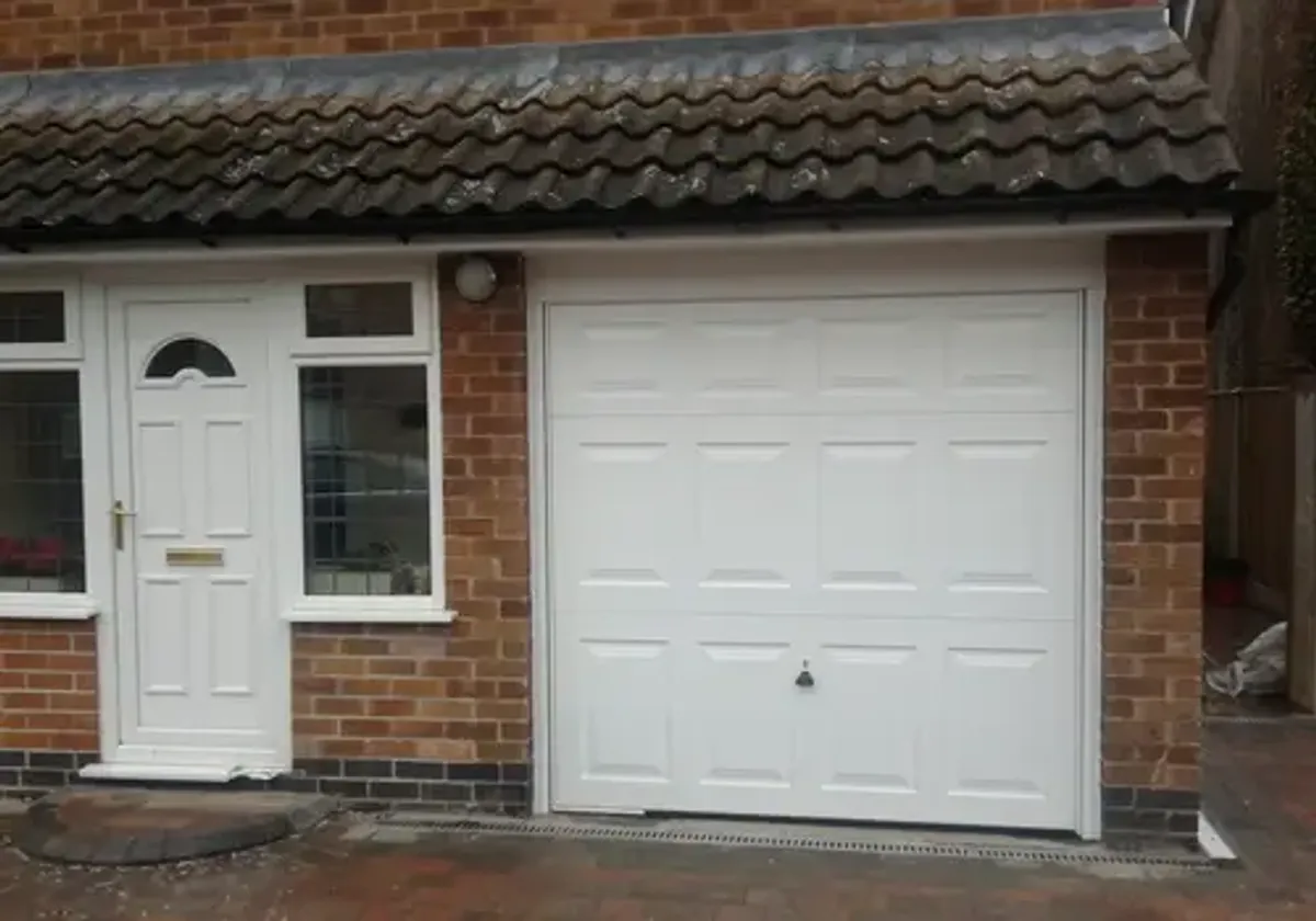 Cover for White Canopy Garage Door Installation in Nottingham - Professional and Reliable Service