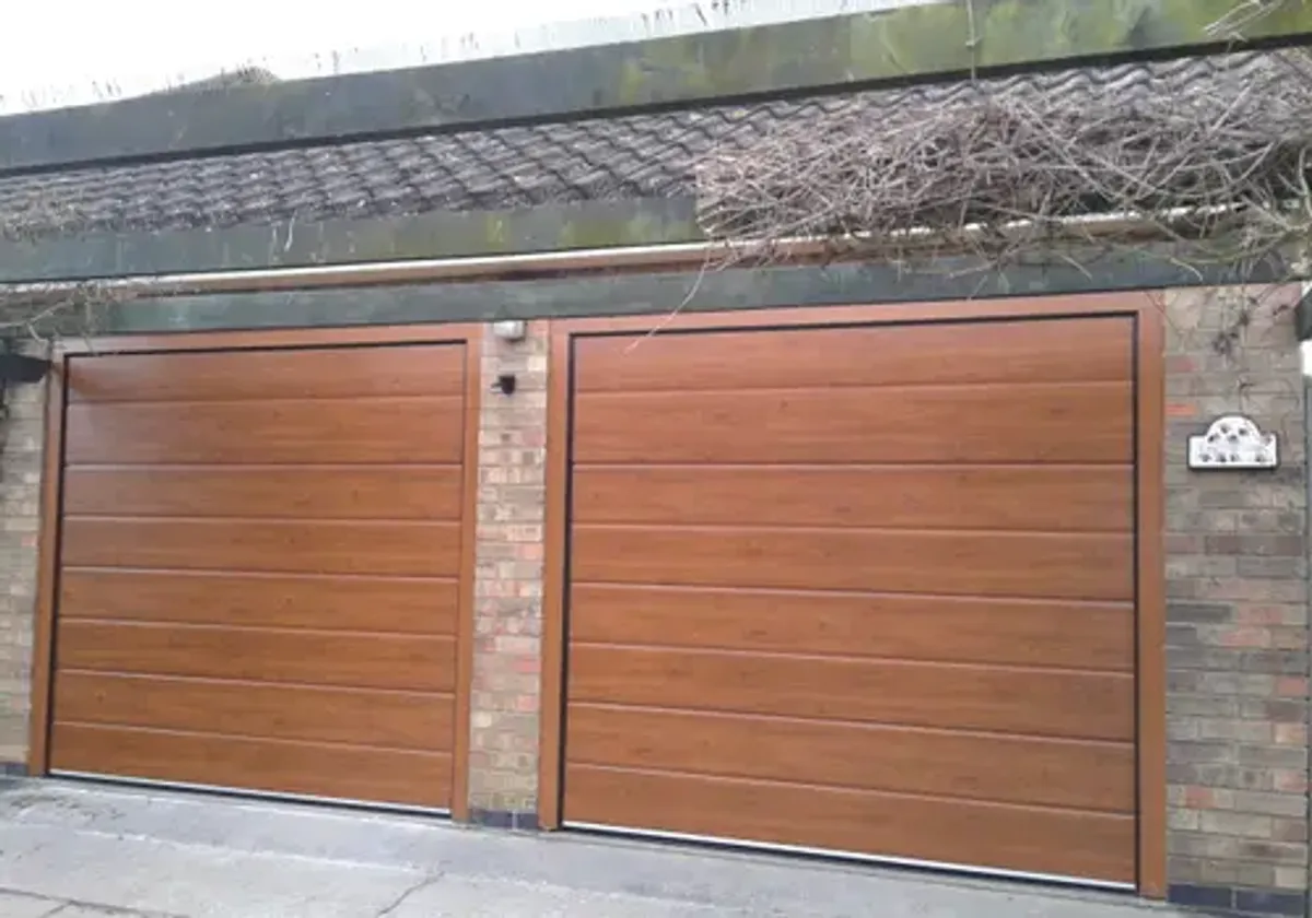 Cover for Stunning Insulated Sectional Garage Doors in Lincoln