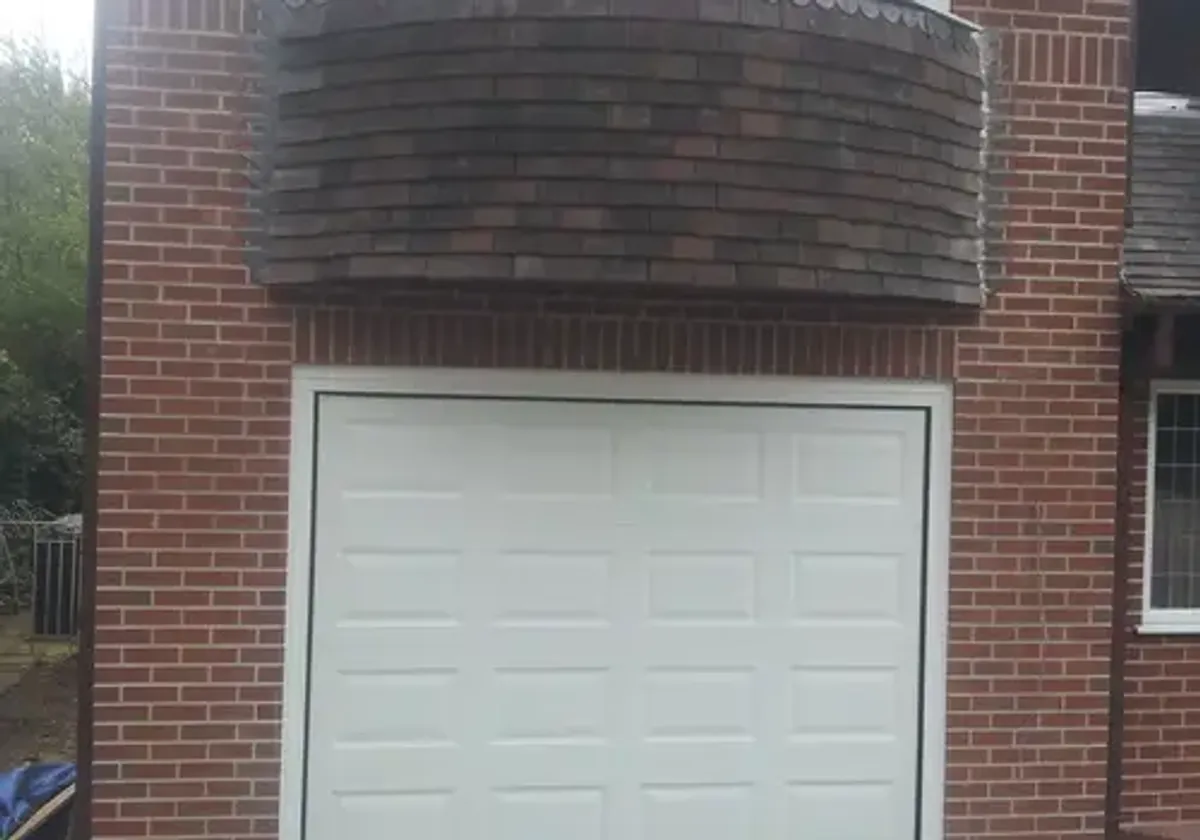 Cover for High-Quality Insulated Sectional Garage Door Installation in Grantham