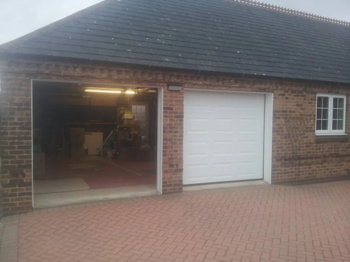 Cover for Beautiful GDS Insulated Sectional Garage Doors in a Georgian Style in Newark