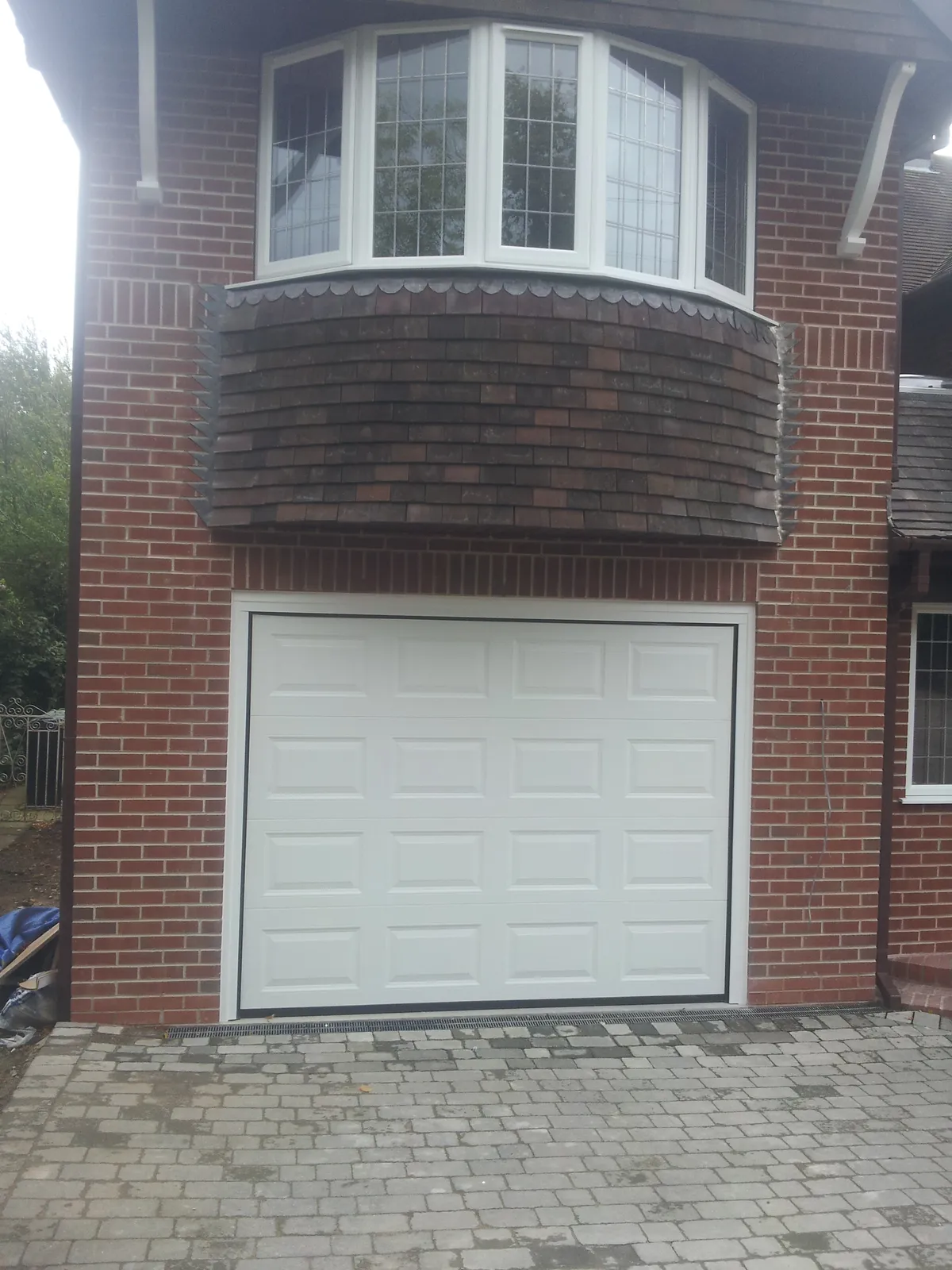 Cover for High-Quality Insulated Sectional Garage Door Installation in Grantham